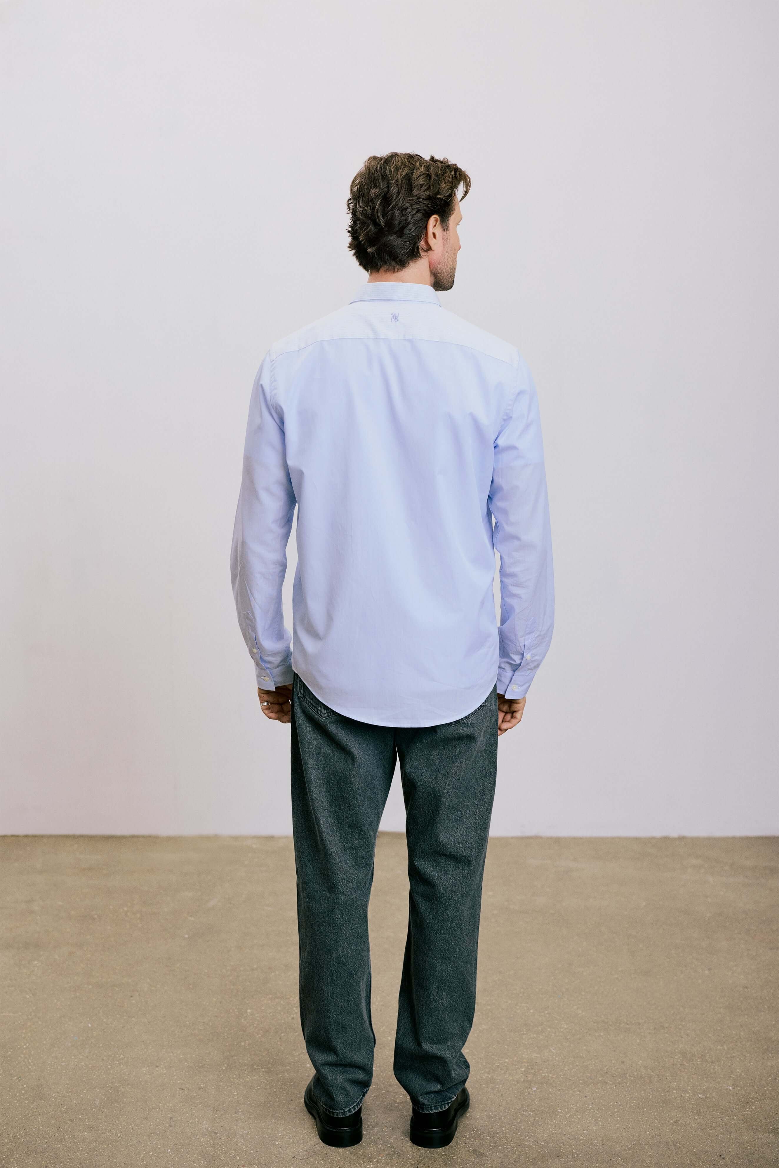 VARRO Rogers Sky Blue Patch Stripe Poplin Shirt — back view showcasing relaxed fit and long sleeves.