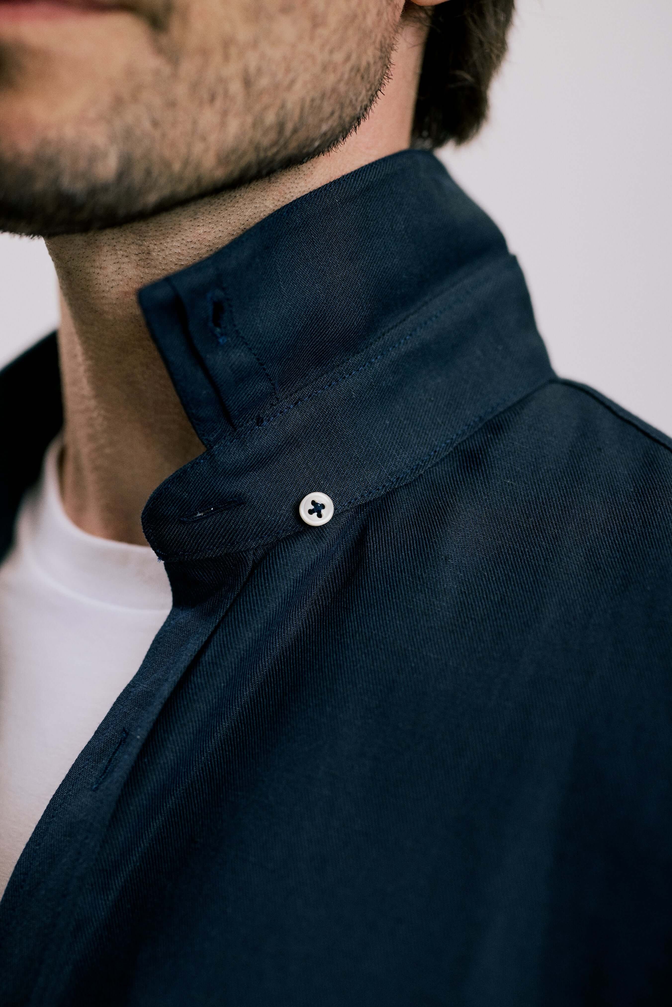Close-up of the hidden button-down collar on the VARRO Evelyn Midnight Navy shirt in hemp cotton merino blend.