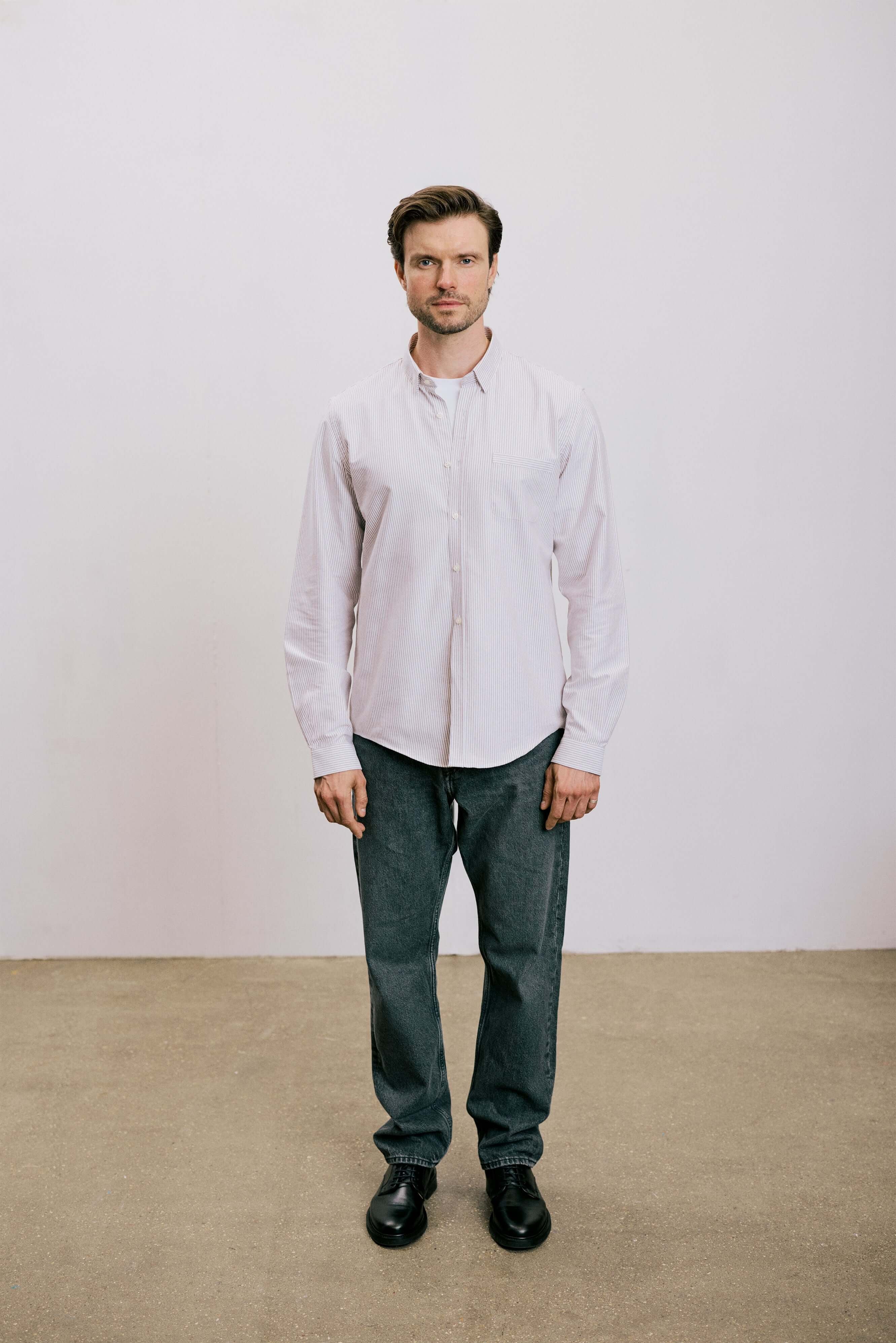 VARRO Keble Blue Stripe Oxford Shirt — Front view of man wearing long sleeve shirt with hidden button-down collar, smart casual style.