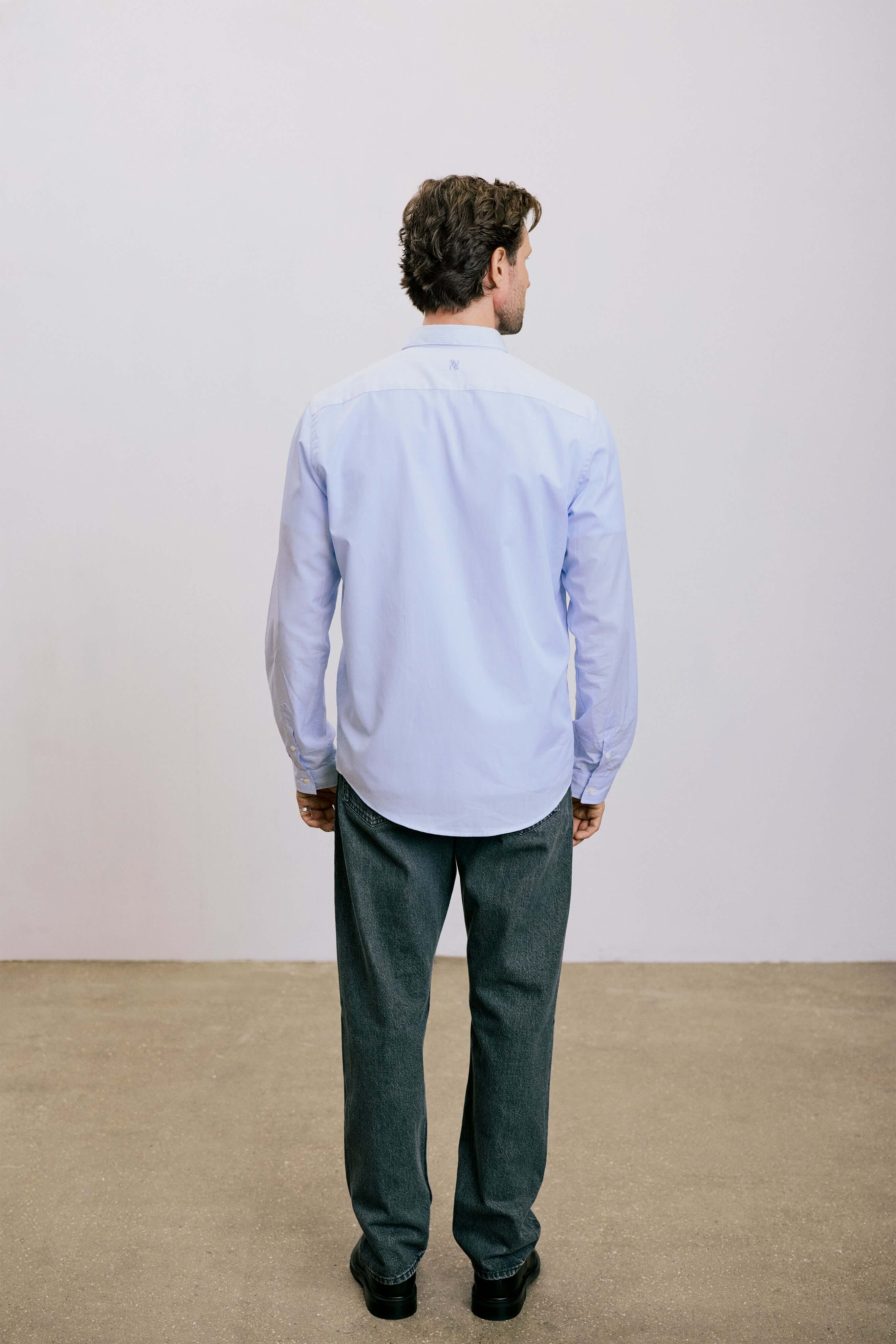 VARRO Rogers Sky Blue Patch Stripe Poplin Shirt — back view showcasing relaxed fit and long sleeves.
