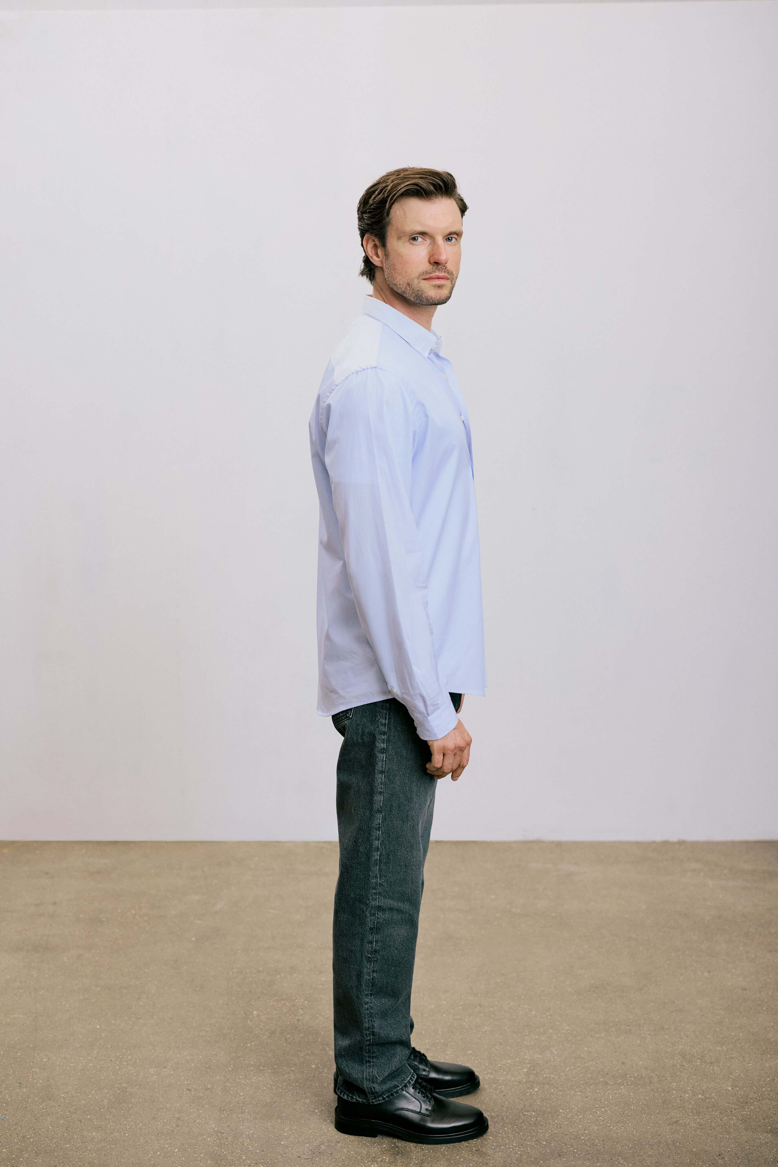 VARRO Rogers Sky Blue Patch Stripe Poplin Shirt — Side view showcasing relaxed fit, long sleeves, and subtle collar details.