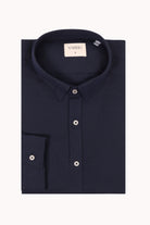 Front view of VARRO Evelyn Midnight Navy shirt, showcasing relaxed fit, hidden button-down collar, and hemp cotton merino blend.