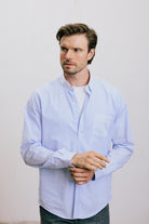 VARRO Rogers Sky Blue Patch Stripe Poplin Shirt — front view showcasing long sleeves, contrast collar, and pocket detail.