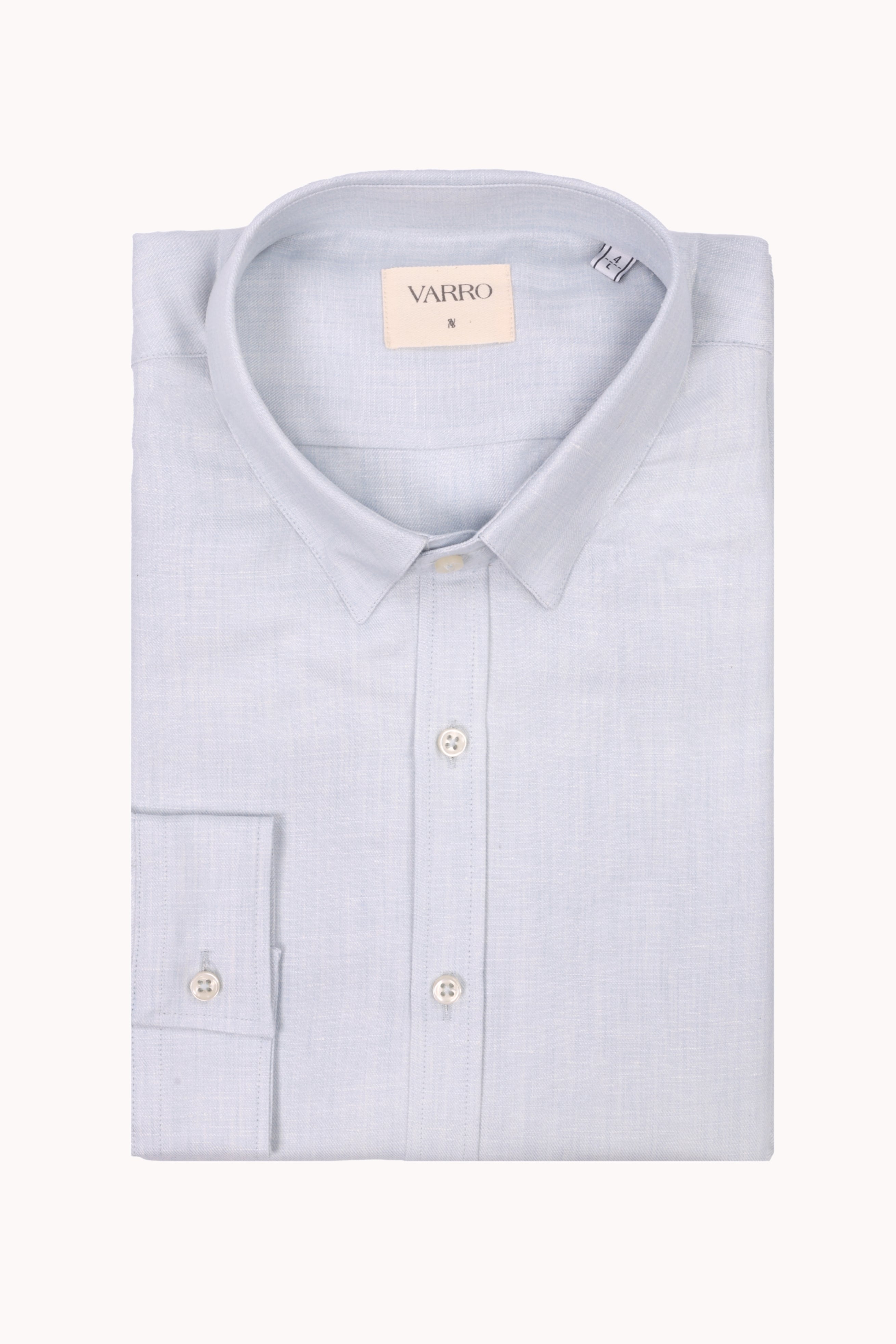 VARRO Evelyn Mist Blue shirt folded, showcasing relaxed fit, hidden button-down collar, long sleeves in hemp cotton merino blend.