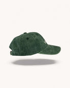 Side profile of Ember Orange cap showing washed fabric texture